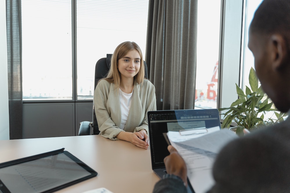 young woman being interviewed