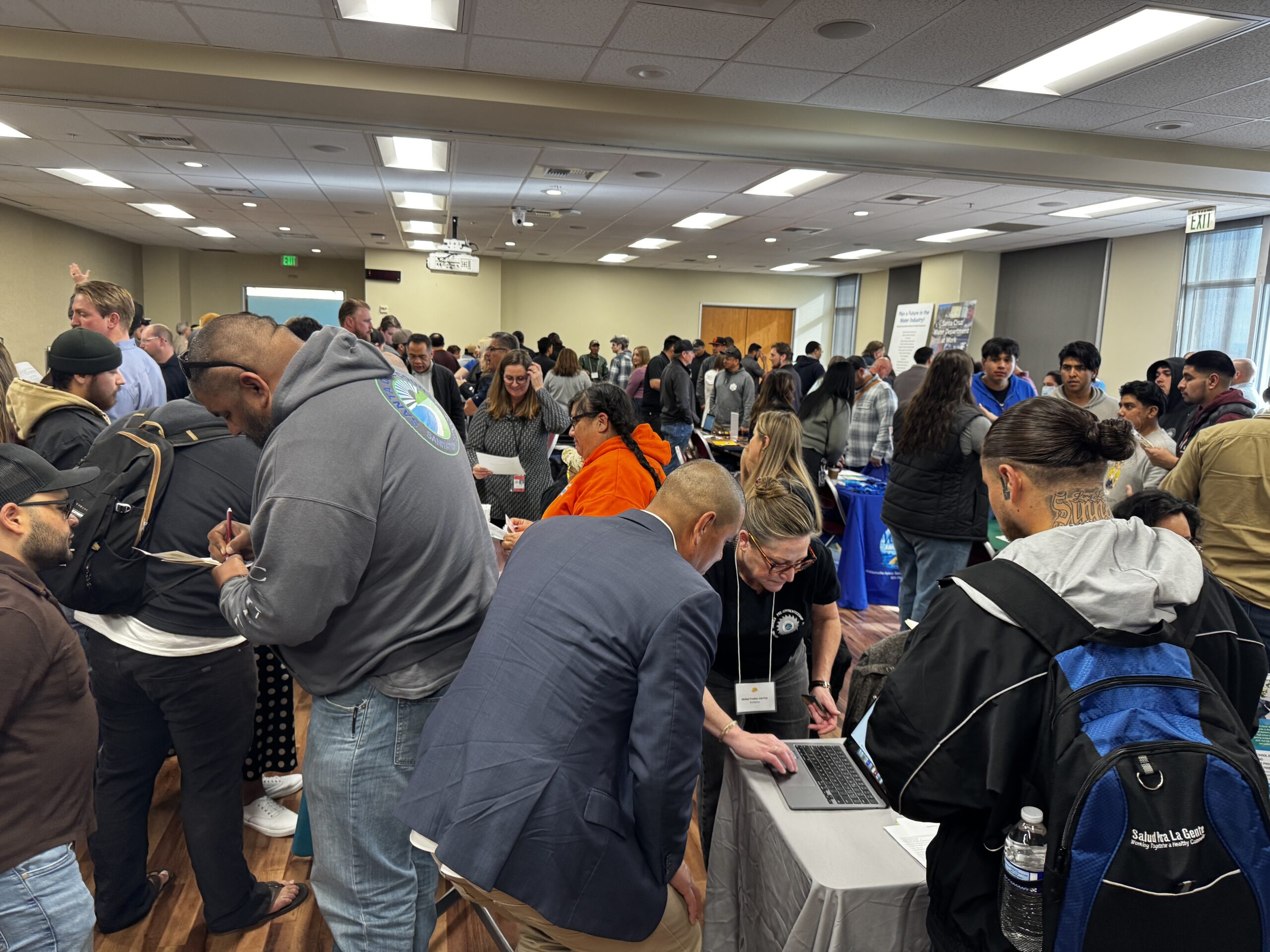 young man looking at a laptop screen